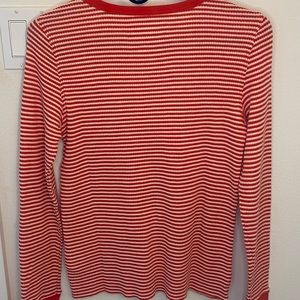 Orange and white striped long sleeve shirt